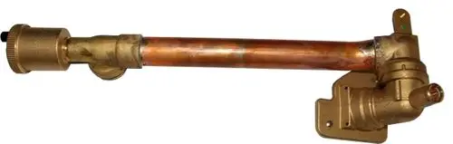 Kippdurchführung aus Kupfer und Messing, Verbindungselement für Heizungsanlagen, präsentiert von Wolf, mit Anschlussstellen und vorgestelltem Mechanismus.